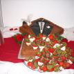 Bride and Groom Strawberries on Tuxedo Cake